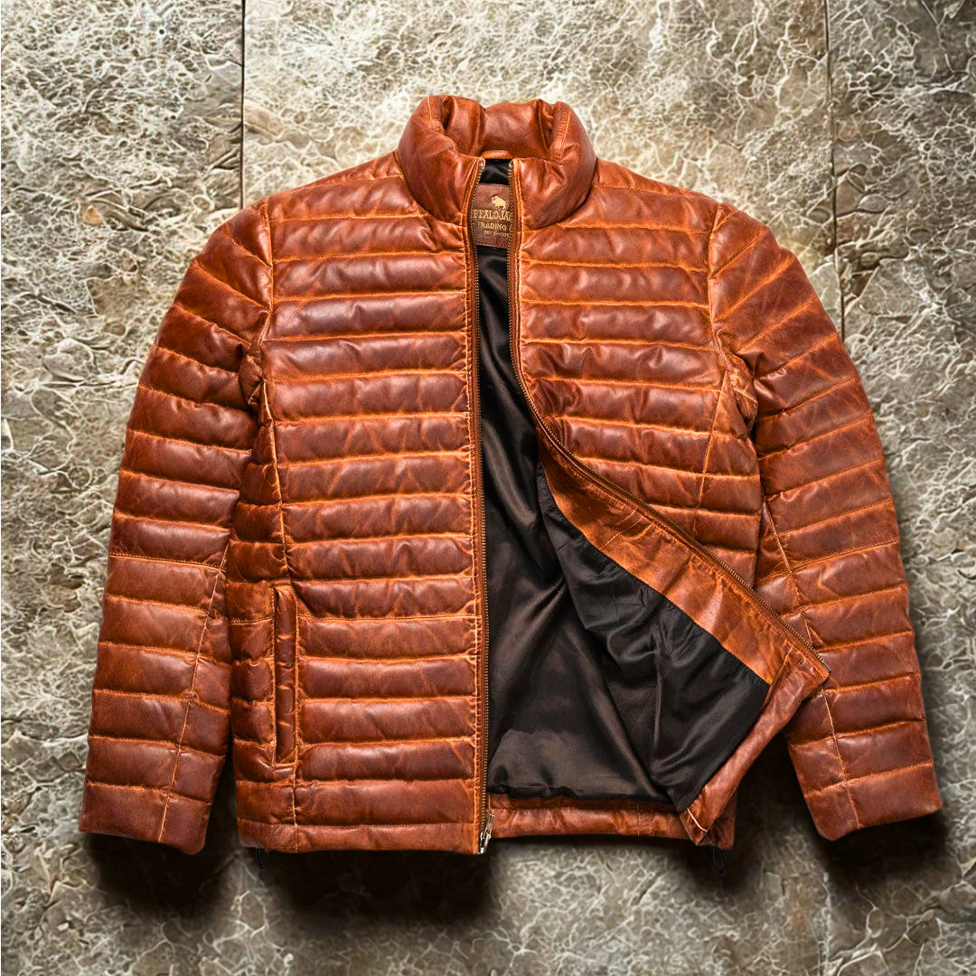 Brown quilted jacket on a textured gray background